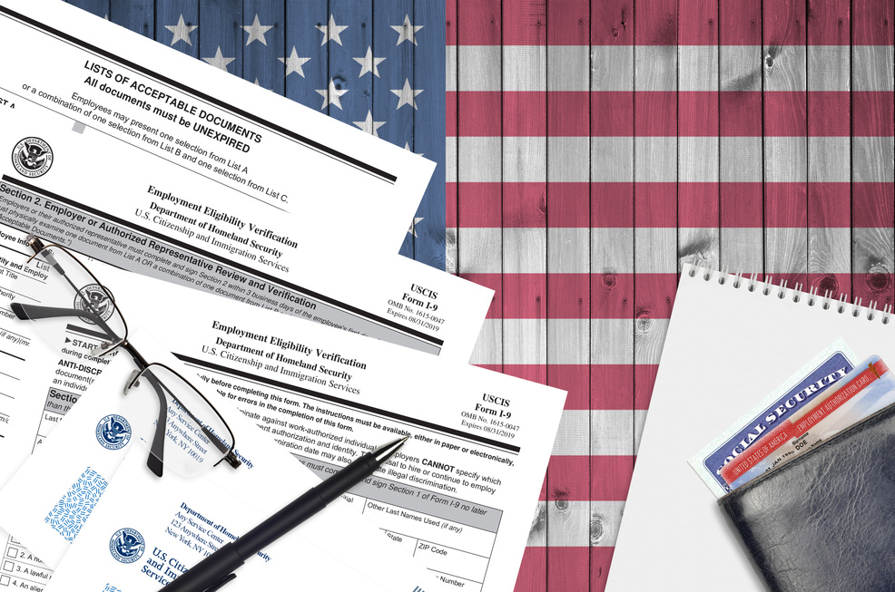 USCIS Form I-9 Employment Eligibility Verification Lies on Office Table